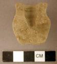 Ground stone, pipe fragment, flared rim