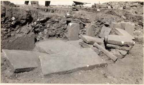 Photograph of Pucara ruins; piles of slabs during excavations of sunken courts, Area 6