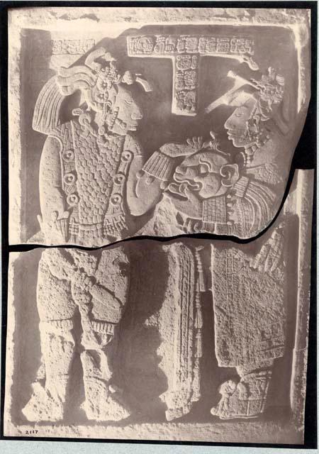 Lintel 26 from Structure 23 (Tiger Temple), showing woman of rank presenting priest with animal's head transformed into a helmet