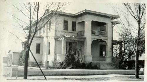 Scan of page from Judge Burt Cosgrove photo album.Sigma Chi House- Tucson, Ariz