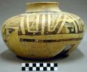Black on yellow pottery jar--restored