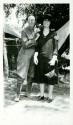Scan of photograph from Judge Burt Cosgrove photo album.Miss. Fannie French and Hattie Swarts Camp July 1927