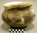 Ceramic jar, plain, flared rim, reconstructed, fire marked