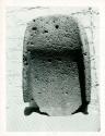 Scan of photograph from Judge Burt Cosgrove photo album."Treasure Hill" Ruin Metate of Lava 12 1/2 x 19 1/2 x 2 3/4 deep inside. Secondary wear 7 inches on end. 3 1/4 inches thick at upper end. 2 inches thick at lower end.