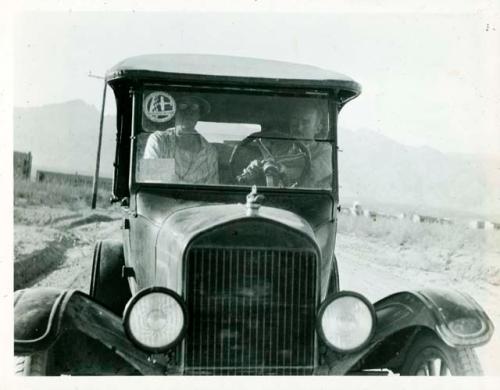 Scan of photograph from Judge Burt Cosgrove photo album.-Mother and Son-