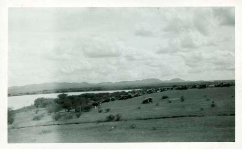 Scan of photograph from Judge Burt Cosgrove photo album.Barbecue at Gill Ranch 60 miles south of Tucson Ariz. Oct, 21-1928 C.B.C. Flew down from Tucson with Burton-Time 45 minutes.