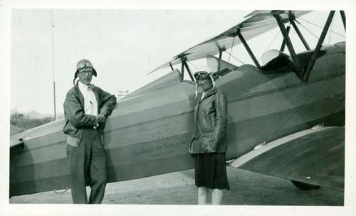 Scan of photograph from Judge Burt Cosgrove photo album.Mr.and Mrs.C.B.C. prepared for a trip over Tucson with their son.Tucson Ariz. 10/28/28