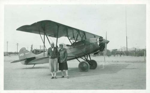 Scan of photograph from Judge Burt Cosgrove photo album. Mr.and Mrs.C.B.C. prepared for a trip over Tucson with their son.Tucson Ariz. 10/28/28