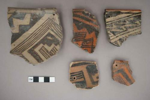 Ceramic sherds, perforated, 6 rim, 1 body