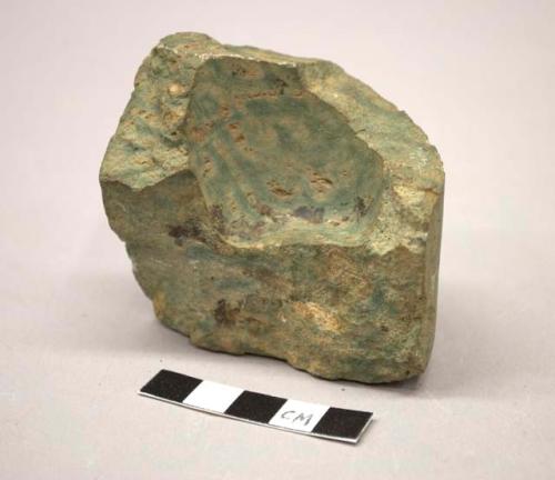 Fragment of stone jar, green