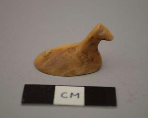 Bird figure, game piece, perforated - made from walrus tooth