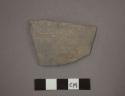 Rim potsherd  (broken)- gray painted, brown on gray (A5)