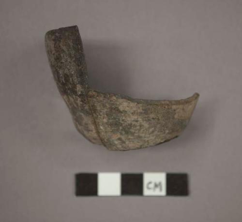 Pottery cup fragment (part of base, rim and sides present)- gray painted,