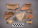 Ceramic sherds - some rim, some body, one base, some handle?