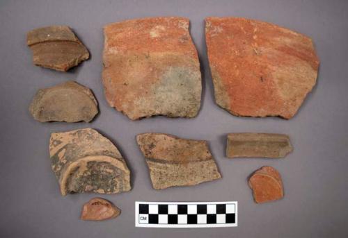 Ceramic sherds - rim, body, or base - some with painted designs