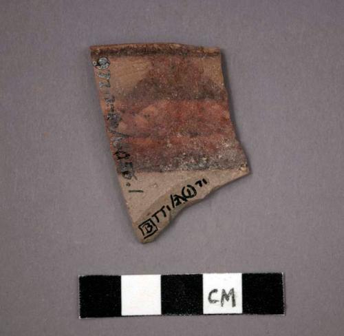 Ceramic rim sherd from bowl, red and black painted designs both sides