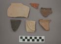 Ceramic rim sherds and one base sherd, some sherds with painted designs