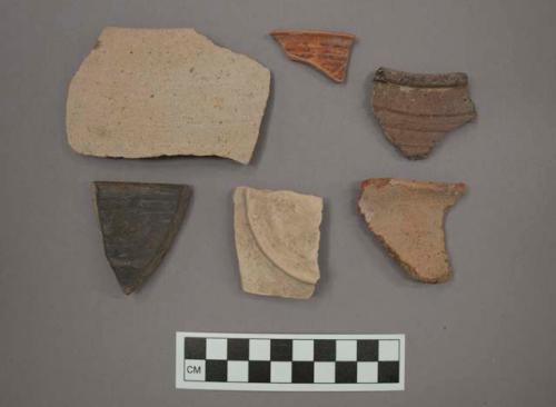 Ceramic rim sherds and one base sherd, some sherds with painted designs