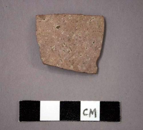 Ceramic body sherd, pinkish in color