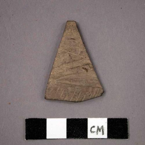 Rim potsherd - gray ware, incised