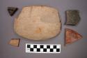 Ceramic rim sherds and a body sherd, some with painted designs