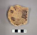 Rough black and yellow dipper sherd