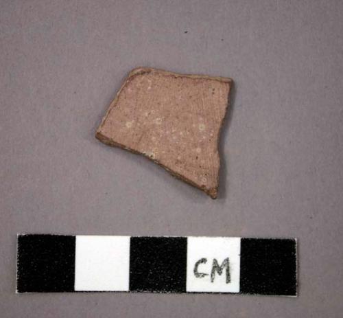 Ceramic body sherd, pinkish in color