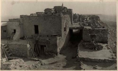 Scan of page from Judge Burt Cosgrove photo album.Antelope Kiva (To North) Walpi Pueblo Aizona Snake Kiva Aug.23 1923