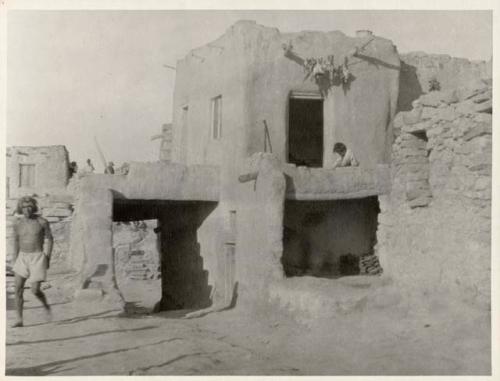 Scan of page from Judge Burt Cosgrove photo album.Snake Priest (To South) Walpi Pueblo Arizona Aug.23-1923