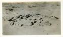 Scan of page from Judge Burt Cosgrove photo album.Basket-maker Site 14 east of Petrified Forest Ariz.