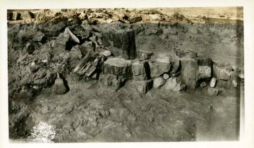 Scan of page from Judge Burt Cosgrove photo album.South wall Room 2 showing poor floor Agate House