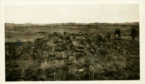 Scan of page from Judge Burt Cosgrove photo album.To East Agate House Petrified Forest Ariz. Excavated by C.B.Cosgrove Jr. Feb 1934.