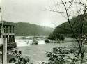 Scan of page from Judge Burt Cosgrove photo album.June 13-1934 Falls in Kanawha River, west of Ansted West VA.