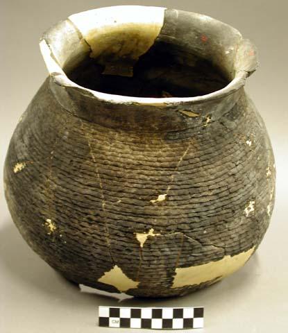 Part of Jeddito black-on-yellow pottery jar