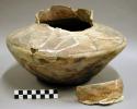 Ceramic jar, straight neck, polychrome exterior, impressed base, 1 sherd inside,