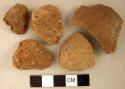 Coarse earthenware feet or lug sherds, undecorated