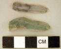 Chipped stone, prismatic blades, one with possible worked notched