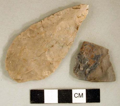 Chipped stone, projectile point, ovate; chipped stone, biface fragment