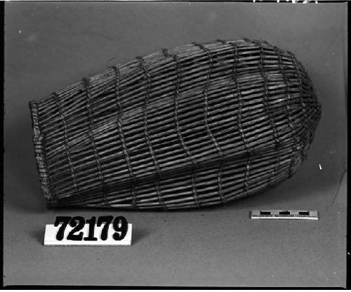 Fish basket from the collection of G. Nicholson. Open twined.