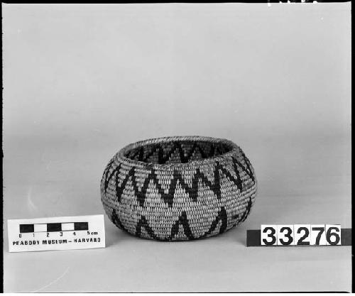 Globular bowl from the collection of H. Wilson, 1923. Coiled, three-rod foundation, mainly non-interlocking stitches.