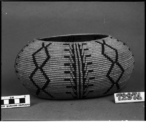 Globular bowl, made by Mary Pool, Paiute of Hot Creek, CA(?). From the collection of C. Hartman. Coiled, three-rod foundation, watchspring start.