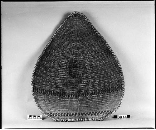 Winnowing or gambling tray from the collection of W.Z. Park. Open, diagonal twined.
