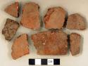 Ceramic, earthenware body and rim sherds, undecorated, grit-tempered; four sherds crossmend; two sherds crossmend