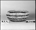 Small bowl from the collection of W.Z. Park. Coiled, one-rod foundation, interlocking stitches.