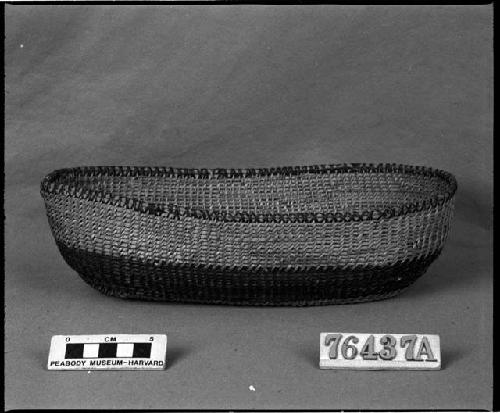 Elliptical bowl from the collection of G. Nicholson and C. Hartman. Open coiled, one-rod foundation, split stitches.