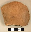 Ceramic, earthenware body sherd, cord-impressed, shell-tempered, some edges worked, possible disk fragment