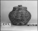 Lidded basket from the collection of G. Nicholson. Open coiled, three-rod foundation, non-interlocking stitches.