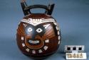 Double spout bottle painted in polychrome with "anthropomorphic mythical being"
