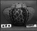 Bottleneck basket, from the collection of C. Hartman. Coiled, (welt and) bundle foundation.