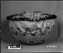 Bottleneck basket with feather decoration, from the collection of G. Nicholson. Coiled, bundle foundation(?).